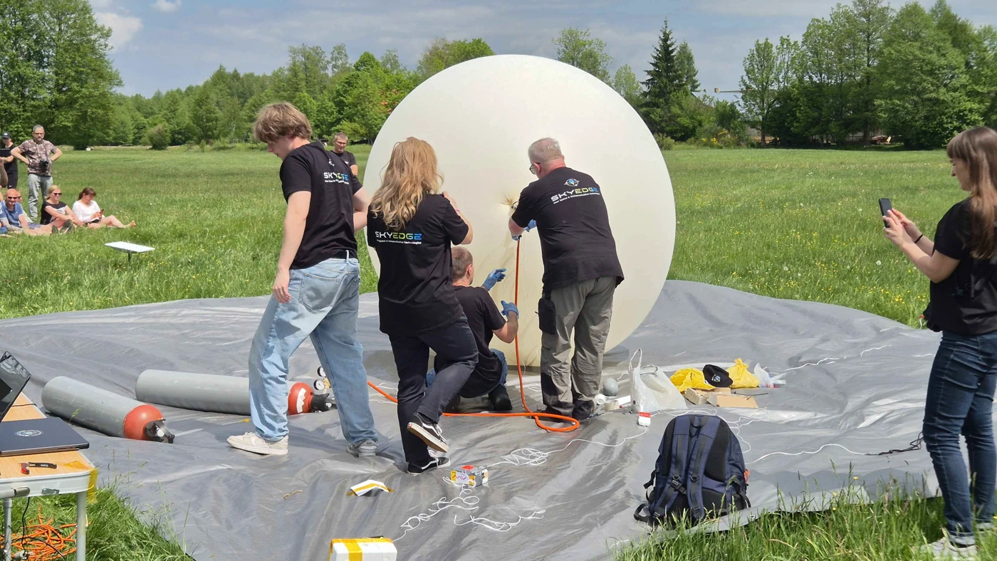 Preparing the balloon before launch.